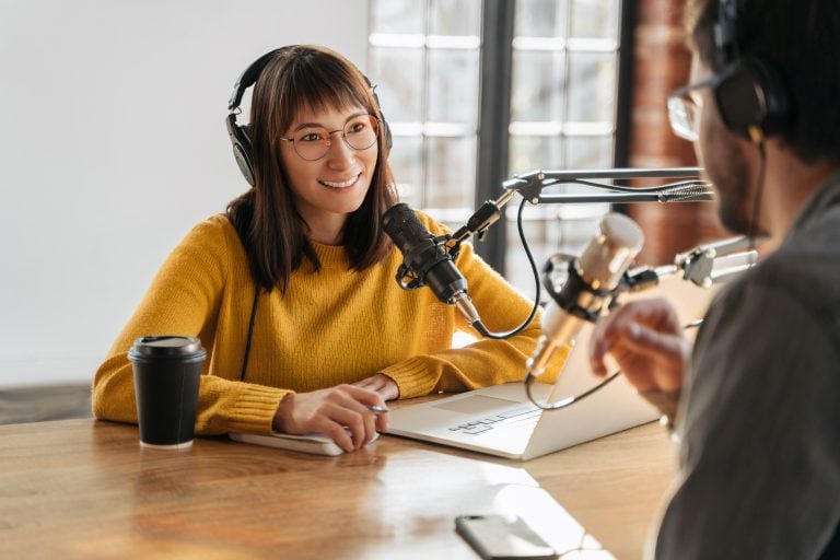 Picture of woman on a podcast