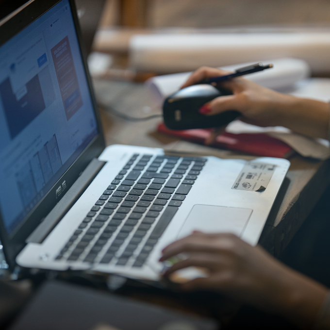 Person typing on a laptop