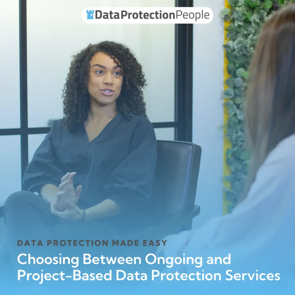 Woman speaking in a meeting about choosing data protection services, with visible text regarding the topic.