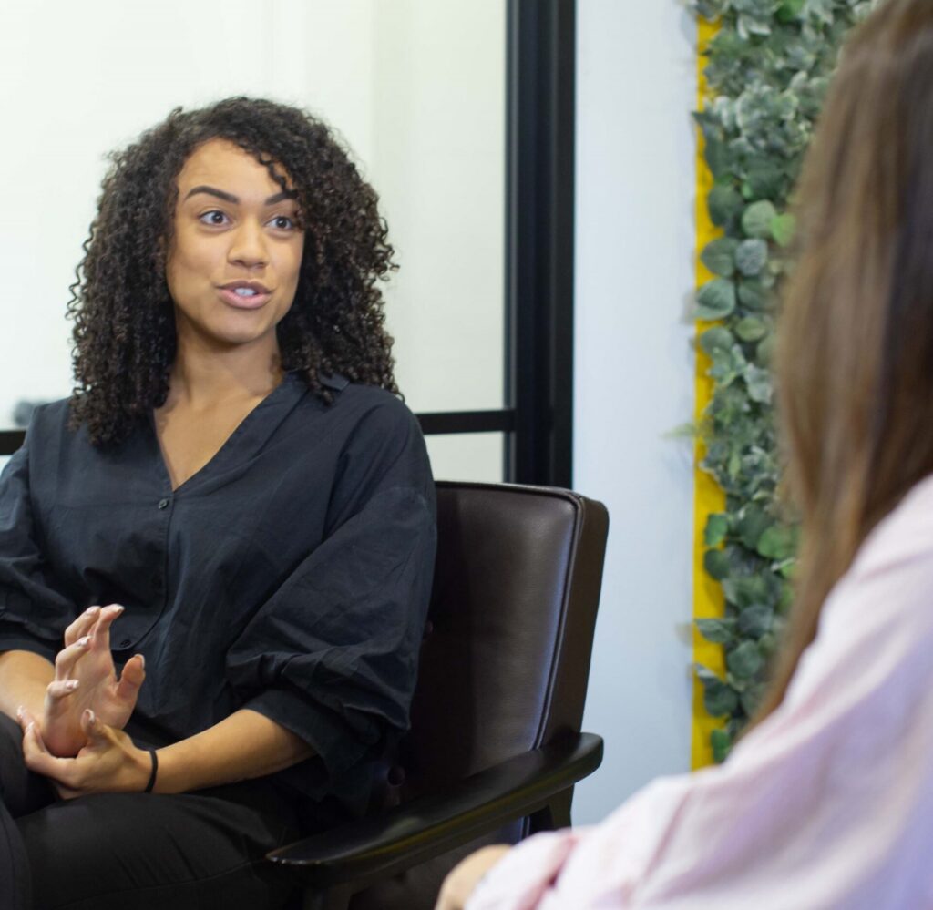 Jasmine Harrison Consulting with a Financial Services Client